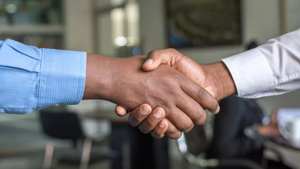 event-analytics-booth-visitor-business-handshake